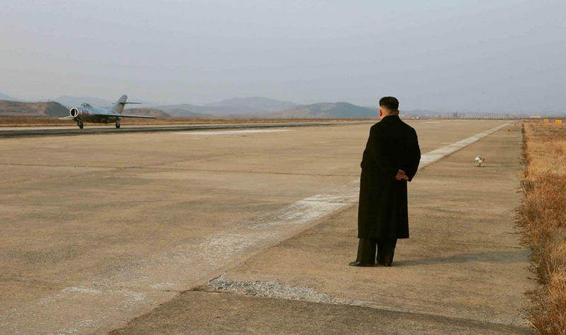 Illustration for article titled Kim Jong Un Visits Female Fighter Pilots, Picks Up Camera For Photo Op